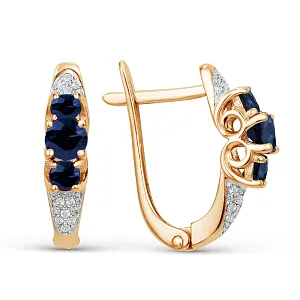 Серьги из красного золота с корундами