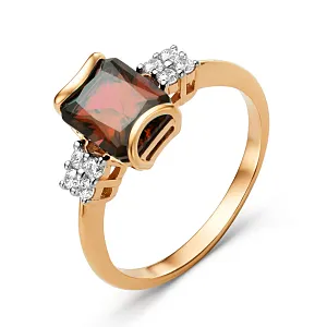 Кольцо из красного золота с гранатом