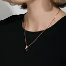 Подвеска из красного золота с гранатом