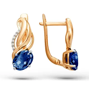 Серьги из красного золота с корундами