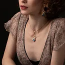 Подвеска из красного золота с лондон топазом