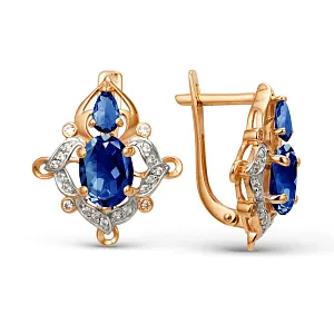 Серьги из красного золота с корундами